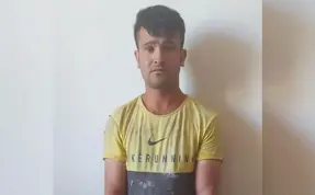 'Jandarma' yazılı gömlekle fotoğraf çekip paylaşım yapan kaçak göçmen yakalandı