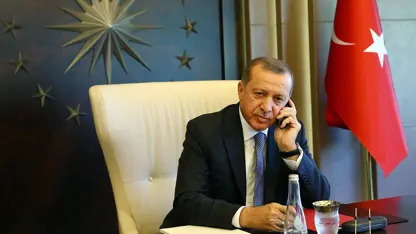 Cumhurbaşkanı Erdoğan'dan darbedilen teşkilat üyesine 