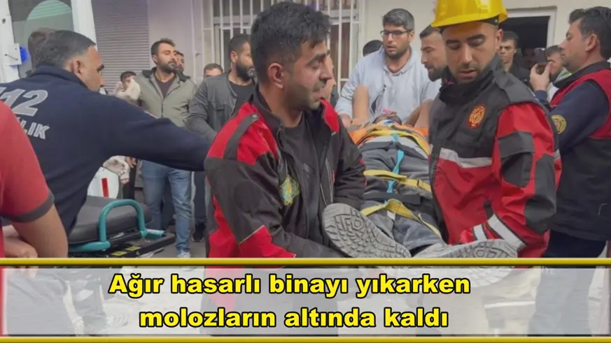 Ağır hasarlı binayı yıkarken  molozların altında kaldı