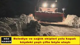 Belediye ve sağlık ekipleri yolu kapalı  köydeki yaşlı çifte böyle ulaştı